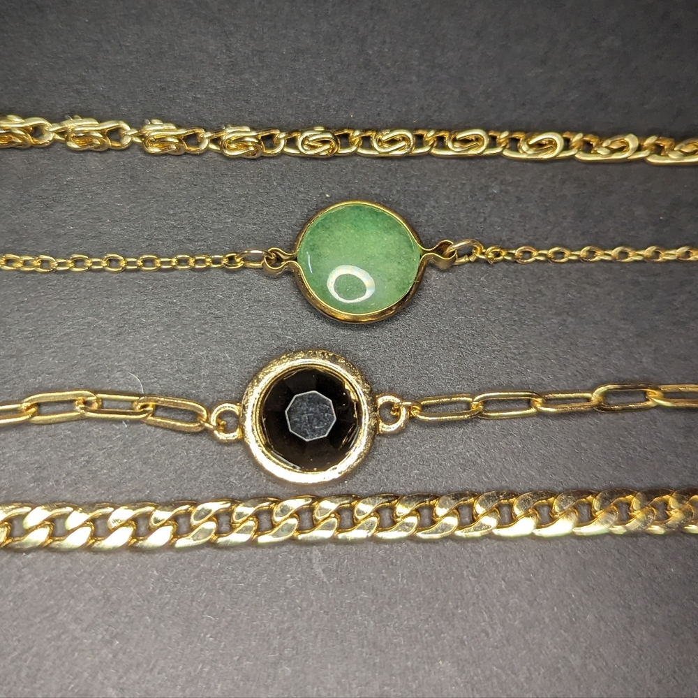 Four piece bracelet set.